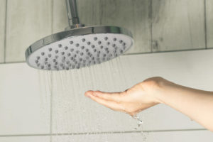 Hot water pouring from a shower head
