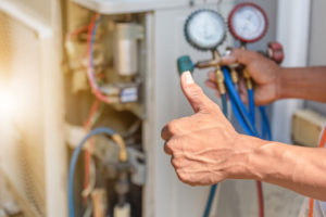 HVAC contractor giving thumbs up